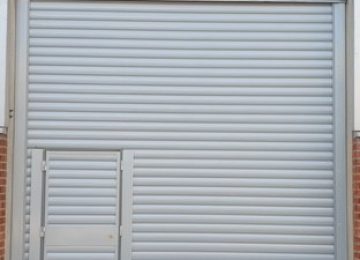 Shutter with wicket door